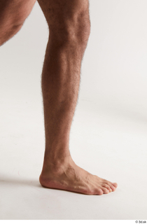 Simeon  1 calf flexing nude side view 0001.jpg